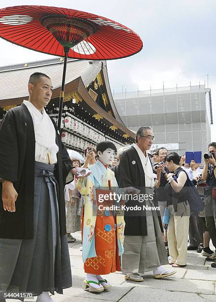 Ryushin Kumeda attends the "Osendo no Gi" ritual to pray for success at the start of the one-month Gion Festival at Yasaka Shrine in Kyoto on July 1,...