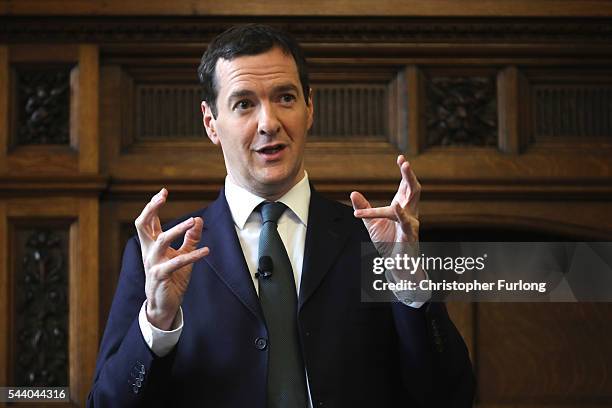 British Chancellor George Osborne addresses guests during a visit to the Manchester Chamber of Commerce on July 1, 2016 in Manchester, England....