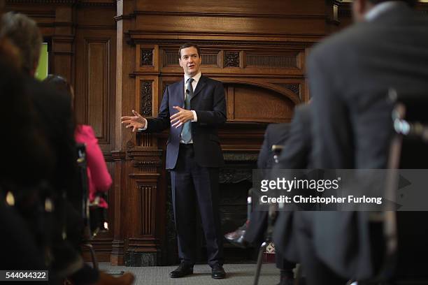 British Chancellor George Osborne addresses guests during a visit to the Manchester Chamber of Commerce on July 1, 2016 in Manchester, England....