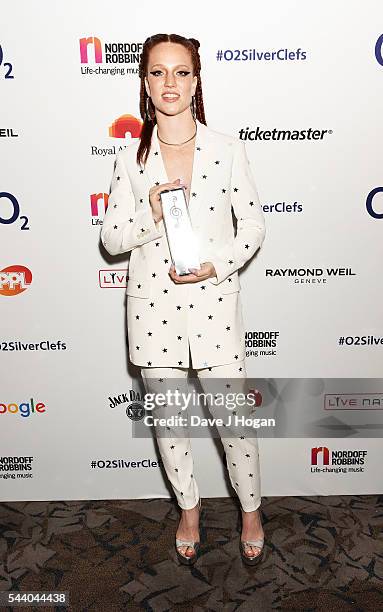 Jess Glynne poses with the Jack Daniel's Best Newcomer Awared during the Nordoff Robbins O2 Silver Clef Awards on July 1, 2016 in London, United...