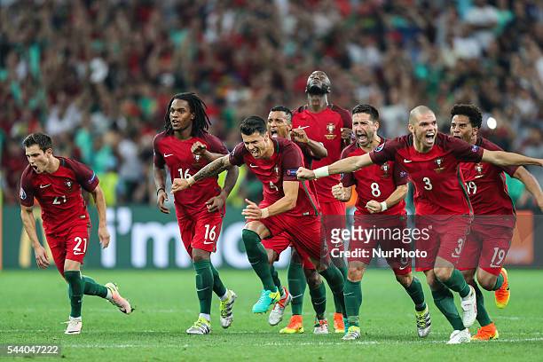 Cedric , Renato Sanches , Jose Fonte , Joao Moutinho , Pepe celebrate during the UEFA EURO 2016 quarter final match between Poland and Portugal at...