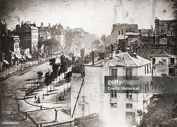 Jacques Louis Daguerre , Boulevard du Temple, Paris, thought to be the first photograph of a living person daguerreotype.