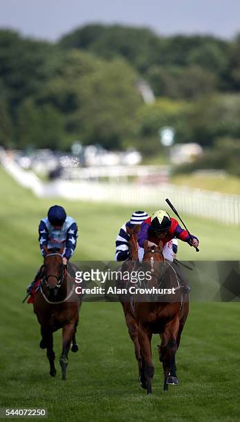 Franny Norton riding The Last Lion win The RacingUK/Daypass Dragon Stakes at Sandown Park on July 01, 2016 in Esher, England.