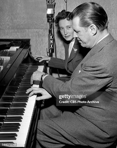 Getting ready for the radio program, Youre In the Act, piano team Phil Ohman and Margaret Hart at CBS-KNX radio studios, Columbia Square, Hollywood,...