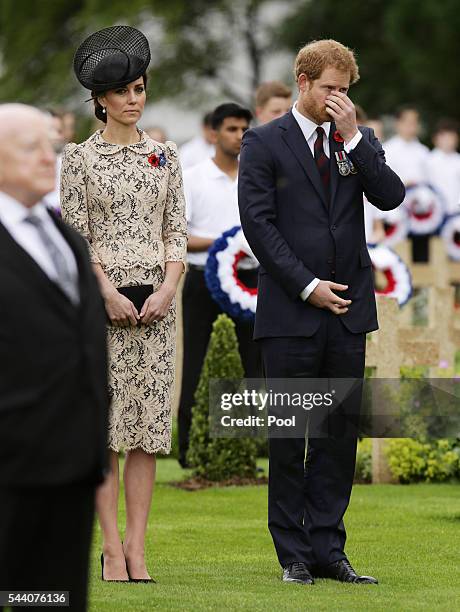 Catherine, Duchess of Cambridge and Prince Harry pay their respects following the wreath laying during the Commemoration of the Centenary of the...