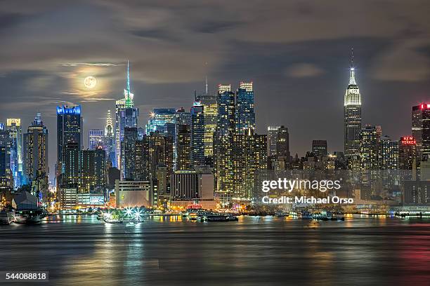 new york city skyline at night. midtown manhattan viewed from new jersey. - i love new york stock pictures, royalty-free photos & images
