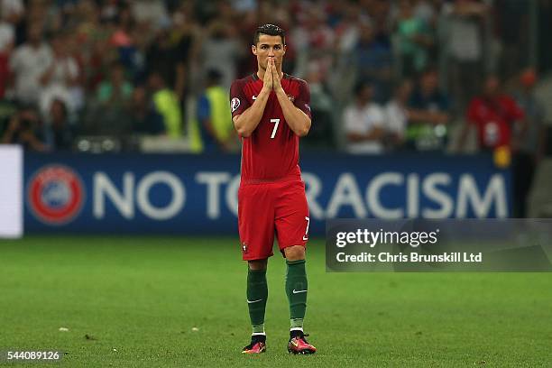 Cristiano Ronaldo of Portugal looks on during the penalty shoot out following the UEFA Euro 2016 Quarter Final match between Poland and Portugal at...