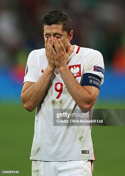 Robert Lewandowski of Poland looks dejected at full-time following the UEFA Euro 2016 Quarter Final match between Poland and Portugal at Stade...