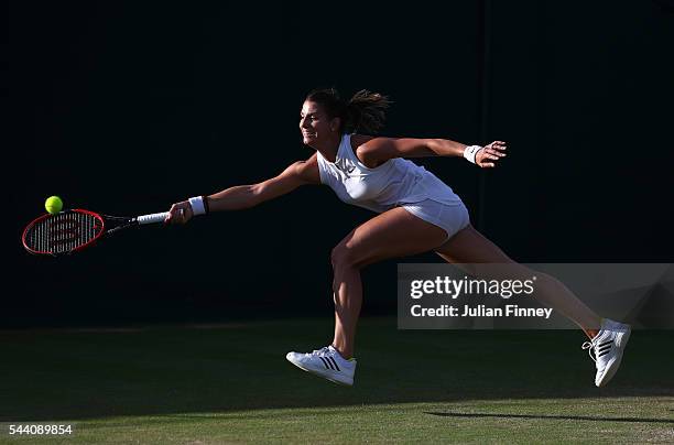 Mandy Minella of Luxembourg plays a forehand during the Ladies Singles second round match against Slone Stephens of The United States on day five of...