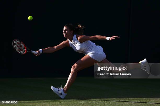 Mandy Minella of Luxembourg plays a forehand during the Ladies Singles second round match against Slone Stephens of The United States on day five of...