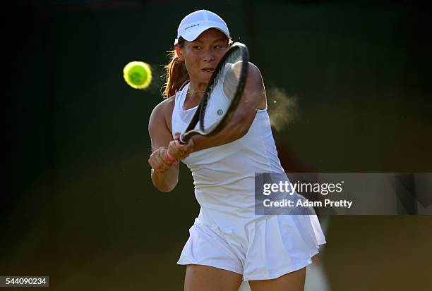 Tara moore of Great Britain plays a backhand the Ladies Singles second round match against Svetlana Kuznetsova of Russia on day five of the Wimbledon...