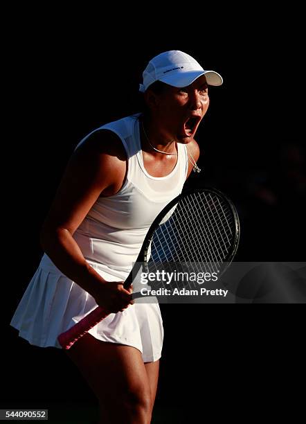 Tara Moore of Great Britain celebrates during the Ladies Singles second round match against Svetlana Kuznetsova of Russia on day five of the...