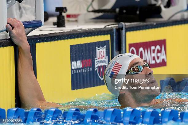 Michael Phelps of the United States reacts after competing in a heat for the Men's 100 Meter Butterfly during Day Six of the 2016 U.S. Olympic Team...