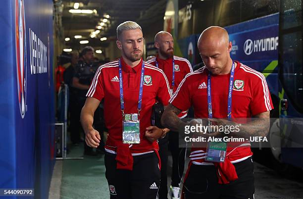 Aaron Ramsey and David Cotterill of Wales are seen on arrival at the stadium prior to the UEFA EURO 2016 quarter final match between Wales and...