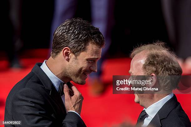 Actors Jamie Dornan and Toby Jones arrive at the opening ceremony of the 51st Karlovy Vary International Film Festival on July 1, 2016 in Karlovy...