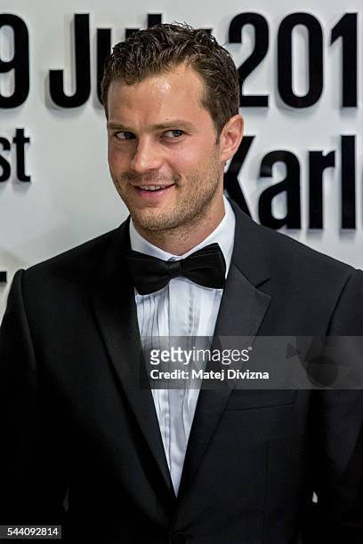 Actor Jamie Dornan poses for photographers at the opening ceremony of the 51st Karlovy Vary International Film Festival on July 1, 2016 in Karlovy...