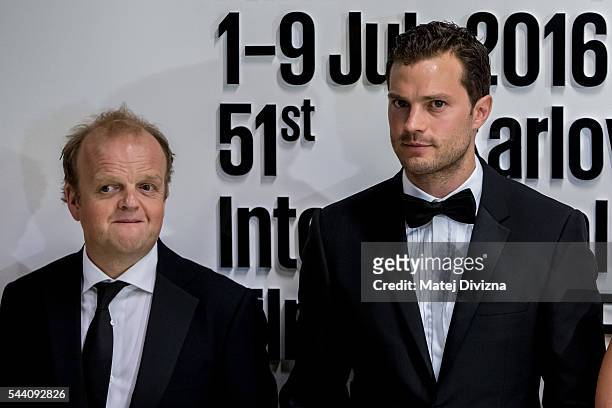 Actors Jamie Dornan and Toby Jones pose for photographers at the opening ceremony of the 51st Karlovy Vary International Film Festival on July 1,...