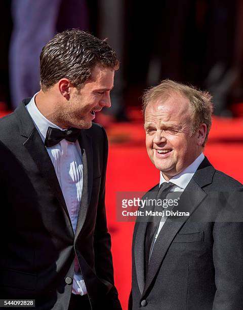 Actors Jamie Dornan and Toby Jones arrive at the opening ceremony of the 51st Karlovy Vary International Film Festival on July 1, 2016 in Karlovy...