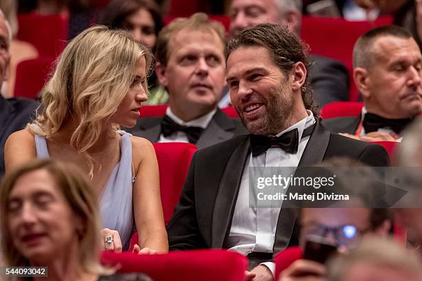 Hockey player Jaromir Jagr with his girlfriend Veronika Koprivova attends the opening ceremony of the 51st Karlovy Vary International Film Festival...