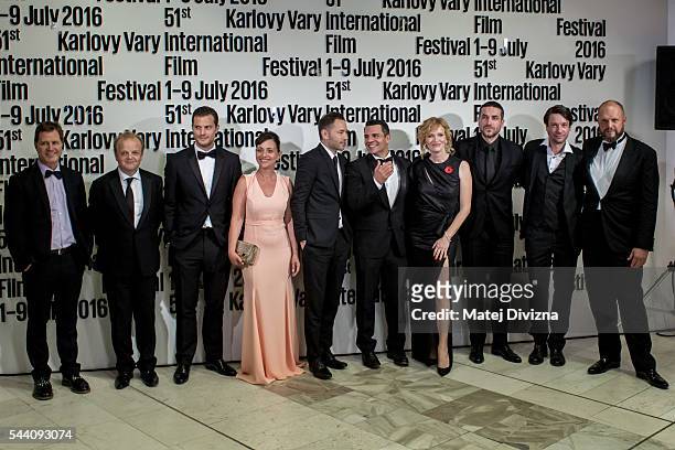 Delegation members of Anthropoid movie, including actors Jamie Dornan and Toby Jones , pose for photographers after world premiere of movie at the...