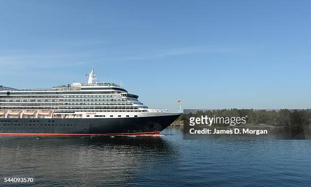 Cunard's Queen Victoria arrives through the archipelago as she approaches Stockholm port on July 11, 2014 in Stockholm, Sweden.