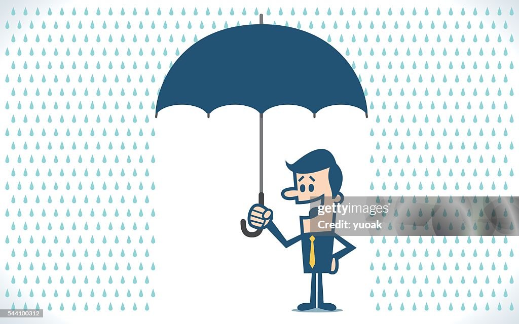 Businessman with umbrella