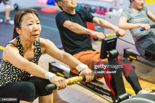 Mature Woman Rowing Machine Photos and Premium High Res Pictures ...