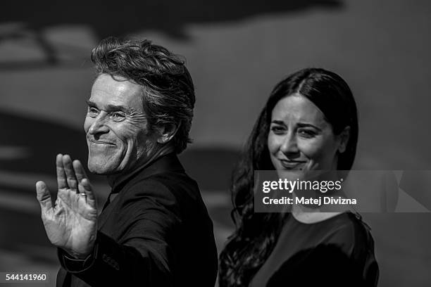 Actor Willem Dafoe with his wife Giada Colagrande arrives at the opening ceremony of the 51st Karlovy Vary International Film Festival on July 1,...