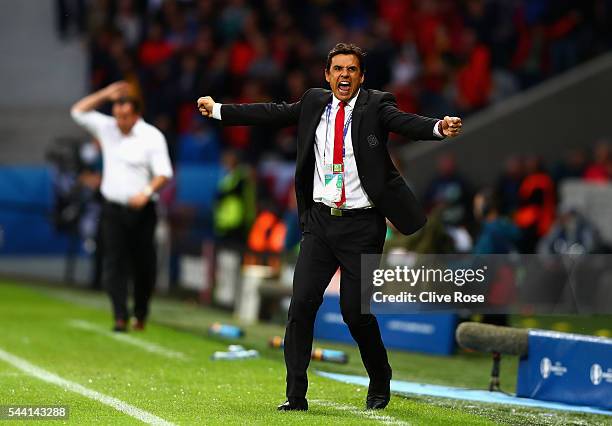 Chris Coleman manager of Wales celebrates his team's first goal during the UEFA EURO 2016 quarter final match between Wales and Belgium at Stade...