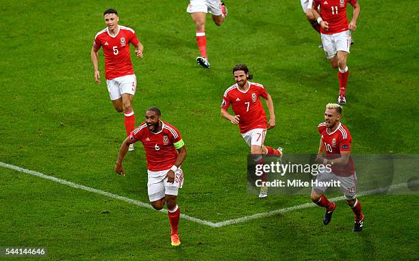 Ashley Williams of Wales celebrates scoring his team's first goal during the UEFA EURO 2016 quarter final match between Wales and Belgium at Stade...