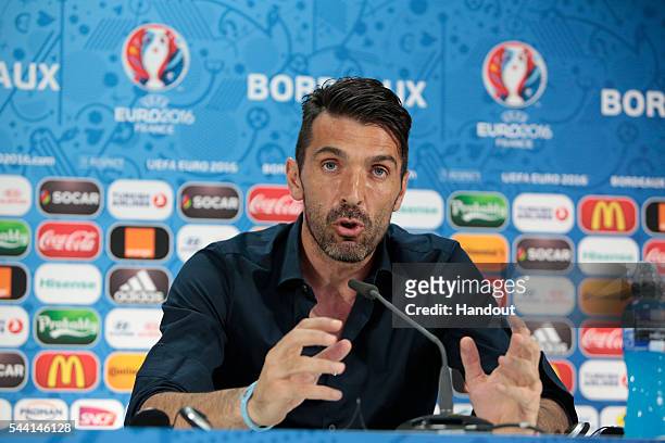 In this handout image provided by UEFA, Gianluigi Buffon speaks to the media during the Italy press conference on July 1, 2016 in Bordeaux, France.