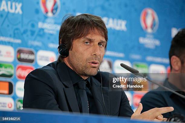 In this handout image provided by UEFA, Head coach Antonio Conte of Italy speaks to the media during the Italy press conference on July 1, 2016 in...