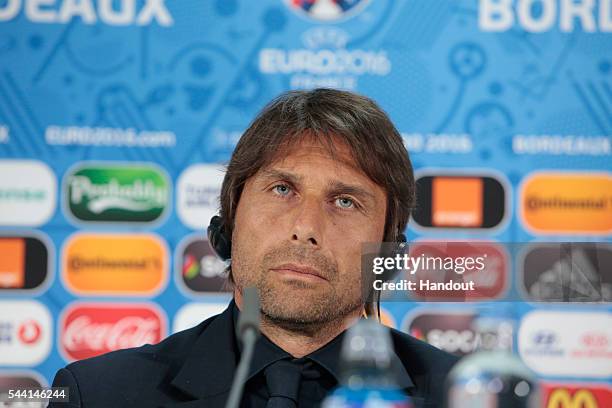In this handout image provided by UEFA, Head coach Antonio Conte of Italy speaks to the media during the Italy press conference on July 1, 2016 in...