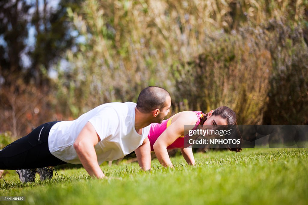Sporty couple exercising