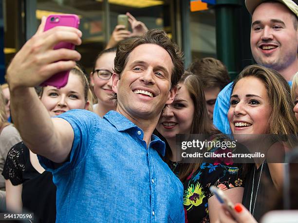 Actor Glenn Howerton poses with fans during filming scenes of season 12 of "It's Always Sunny In Philadelphia" sitcom on July 1, 2016 in...