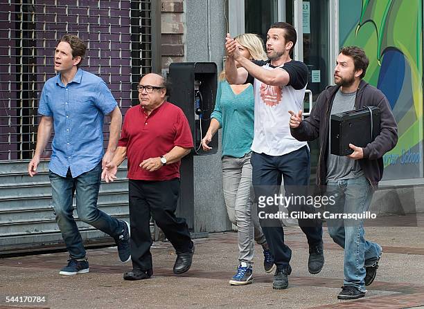 Actors Glenn Howerton, Danny DeVito, Kaitlin Olson, Rob McElhenney and Charlie Day are seen filming scenes of season 12 of "It's Always Sunny In...