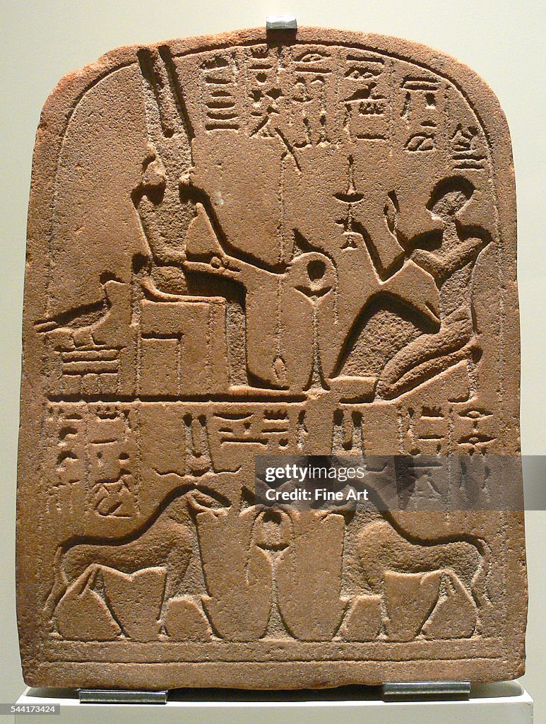 Egyptian stela with Amun in various forms
