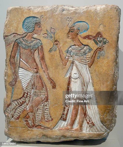 Relief of a royal couple in the Armana style; figures have variously been attributed as Akhenaten and Nefertiti, Smenkhkare and Meritaten, or...