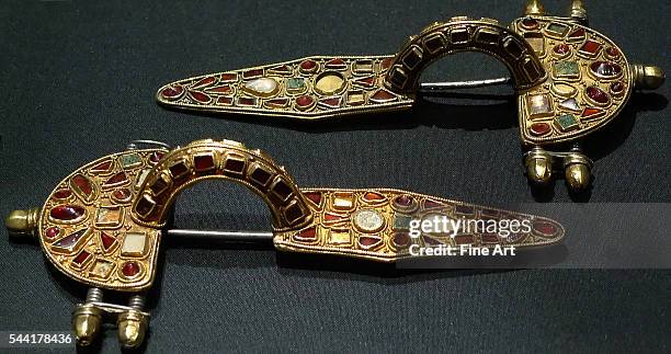 Pair of East Germanic womens' fibulae, goldfoil on silver with inlaid garnet, glass, enamel. From the Untersiebenbrunn grave , early 5th century....
