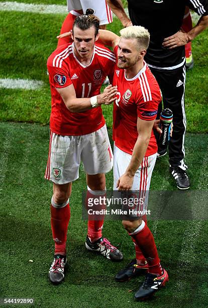 Gareth Bale and Aaron Ramsey of Wales celebrate after their team's 3-1 winafter the UEFA EURO 2016 quarter final match between Wales and Belgium at...