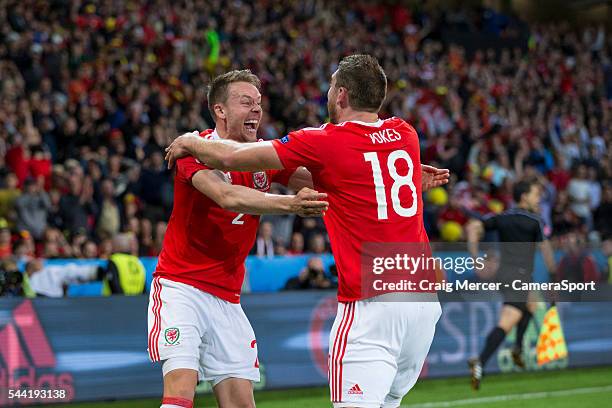 Wales's Sam Vokes celebrates scoring his sides third goal with team mate Chris Gunter during the UEFA Euro 2016 Quarter-final match between Wales and...