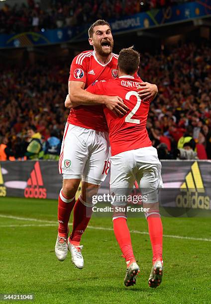 Wales player Sam Vokes celebrates his goal with Chris Gunter during the UEFA Euro 2016 Quarter Final match between Wales and Belguim at Stade...