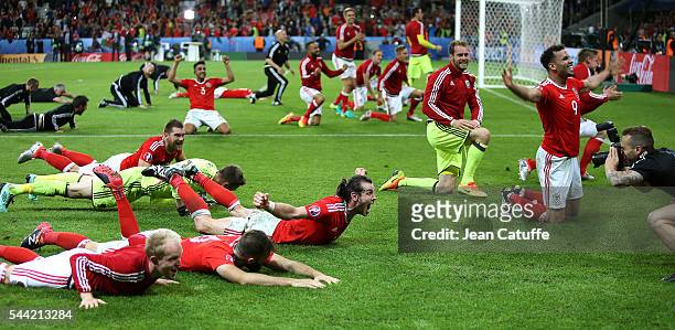 Gareth Bale, Hal Robson-Kanu of Wales and teammates celebrate the victory following the UEFA Euro 2016 quarter final match between Wales and Belgium...