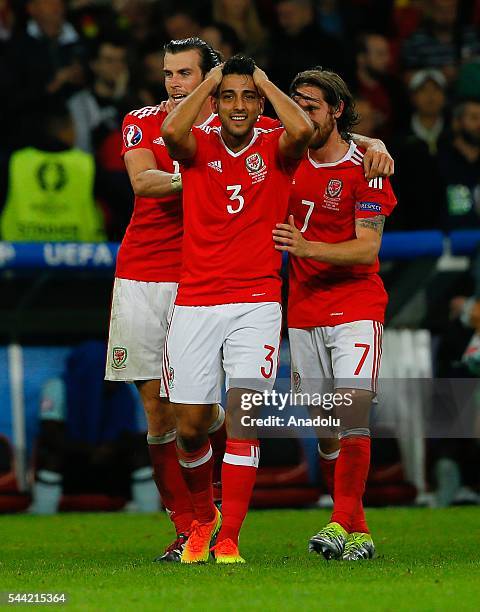 Players of Wales celebrate the victory following the UEFA Euro 2016 quarter final match between Wales and Belgium at Stade Pierre-Mauroy on July 1,...