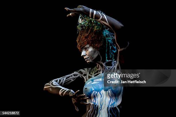Model poses for a picture during the World Bodypainting Festival 2016 on July 1, 2016 in Poertschach am Woerthersee, Austria.