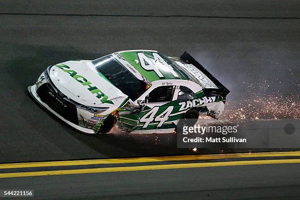 Yeley, driver of the Zachry Toyota, has an on track incident during the NASCAR XFINITY Series Subway Firecracker 250 at Daytona International...