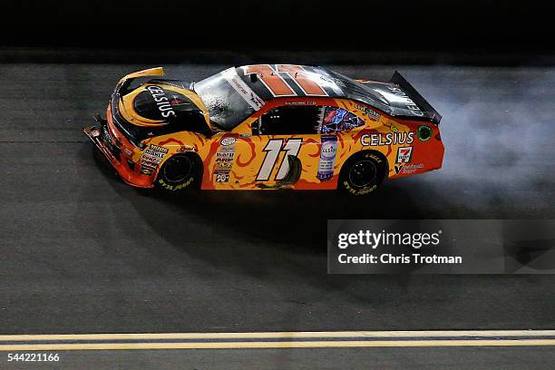 Blake Koch, driver of the Celsius Thermogenic Energy Chevrolet, has an on track incident during the NASCAR XFINITY Series Subway Firecracker 250 at...