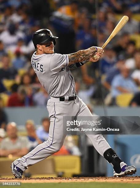 Brandon Barnes of the Colorado Rockies flys out in the fifth inning of the game at Dodger Stadium on July 1, 2016 in Los Angeles, California.