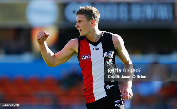 Jack Newnes of the saints celebrates a goal during the round 15 AFL match between the Gold Coast Suns and the St Kilda Saints at Metricon Stadium on...