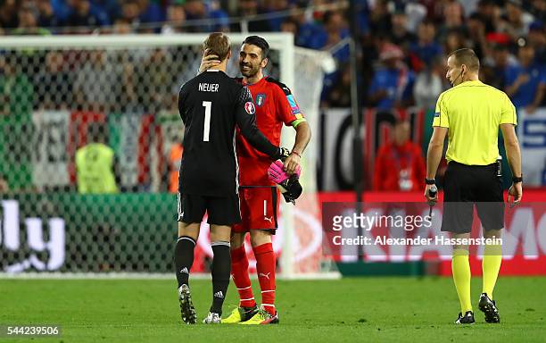 Manuel Neuer of Germany and Gianluigi Buffon of Italy interact before the penalty shootout during the UEFA EURO 2016 quarter final match between...